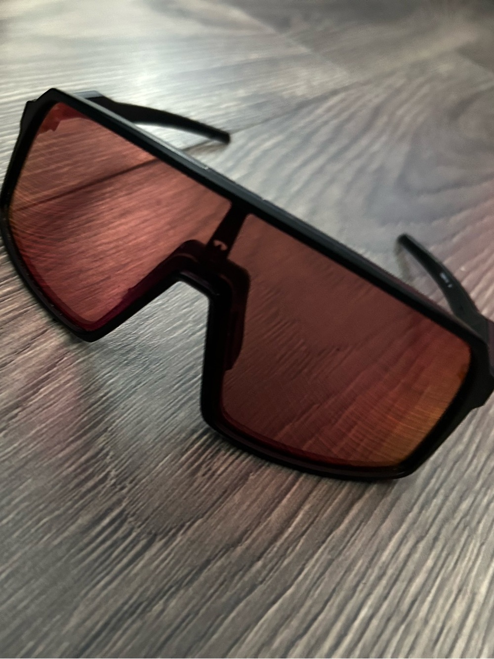 Oakley Men's Black Frame Sunglasses with Red Lenses - Shield Style